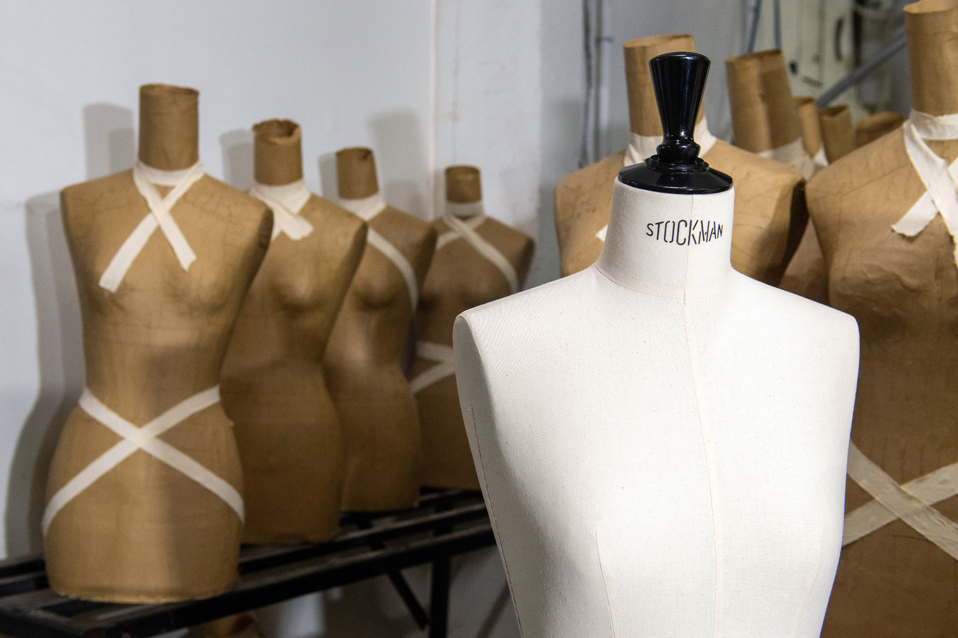 Stockman forms lined up at the atelier workshop